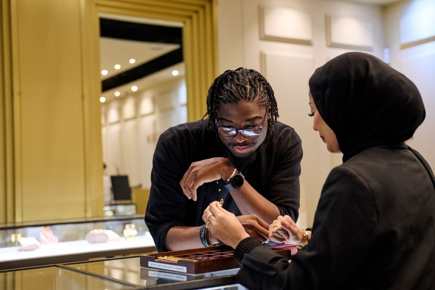 lady and man looking at jewellery